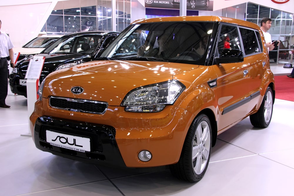 Brown Kia Soul on car showroom