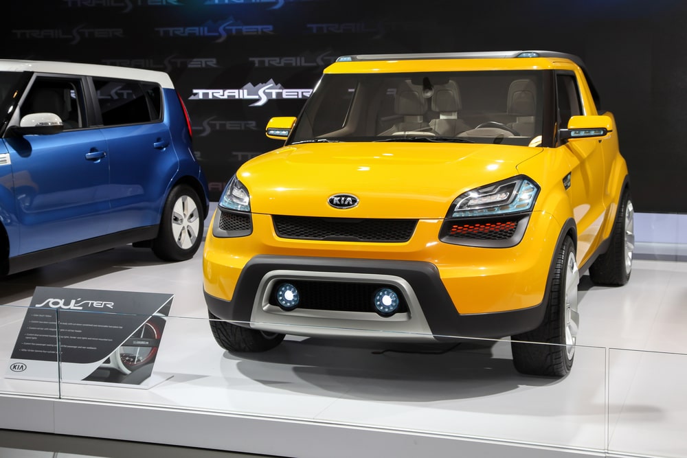 Yellow Kia Soul on car showroom