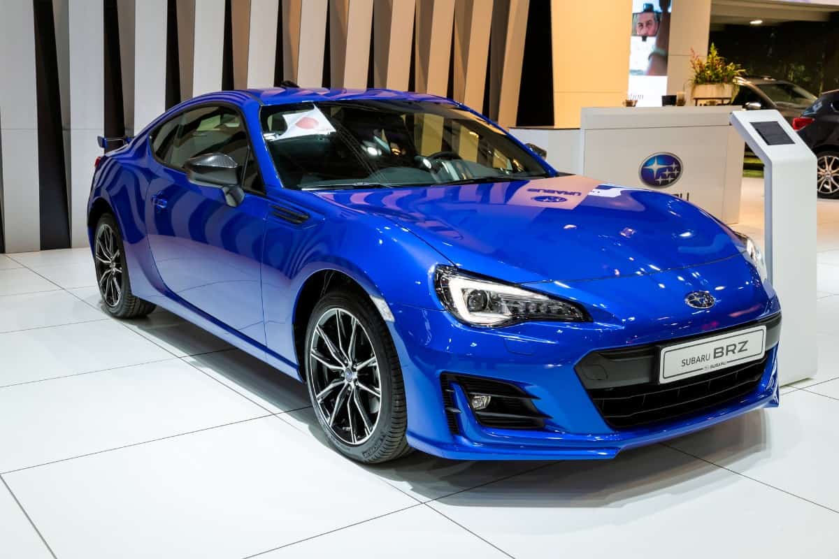 Blue Subaru BRX displayed in motor show.