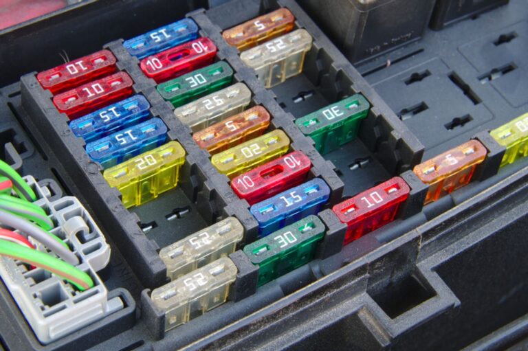 Car fuse box, focused shot.