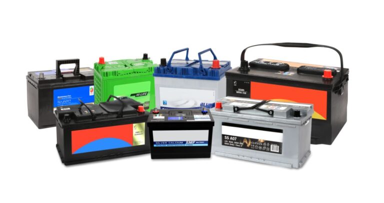 A row of different type of car batteries.