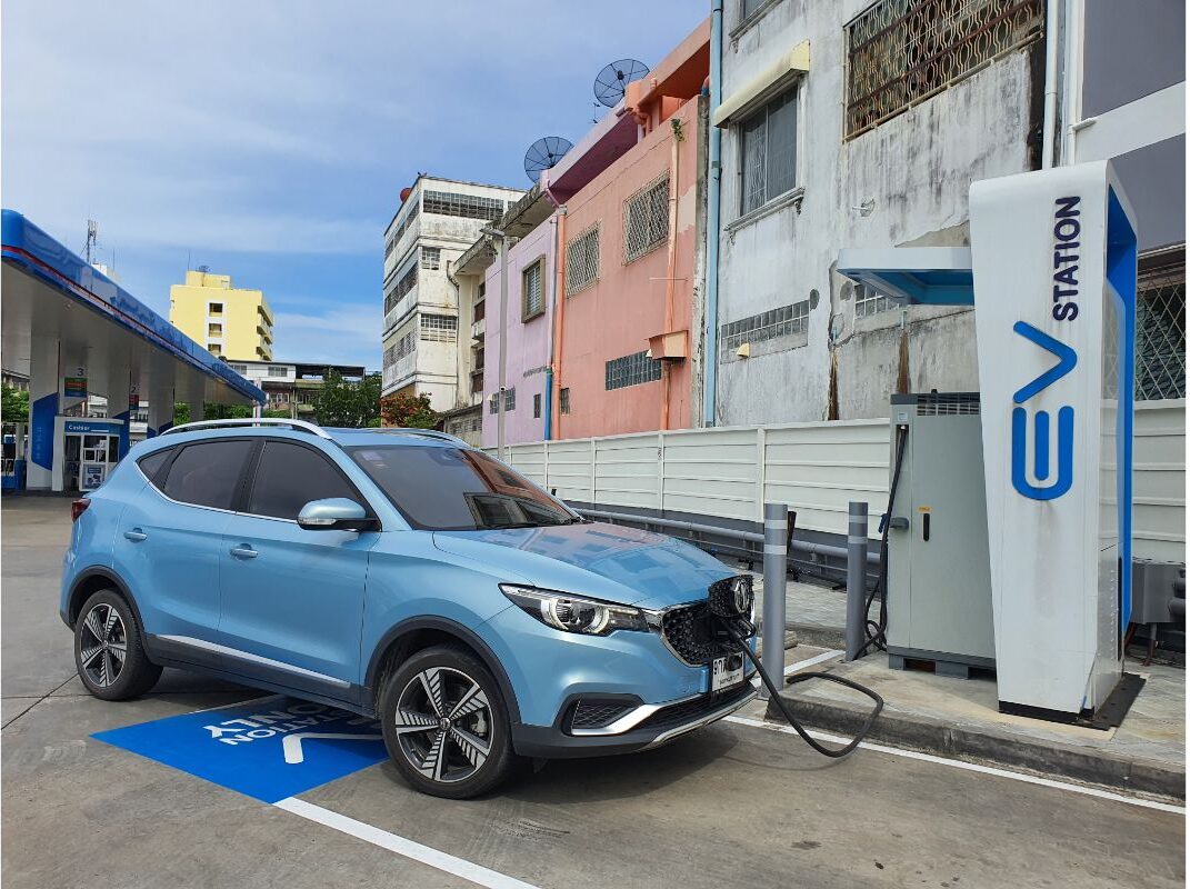 A blue car recharging photo.