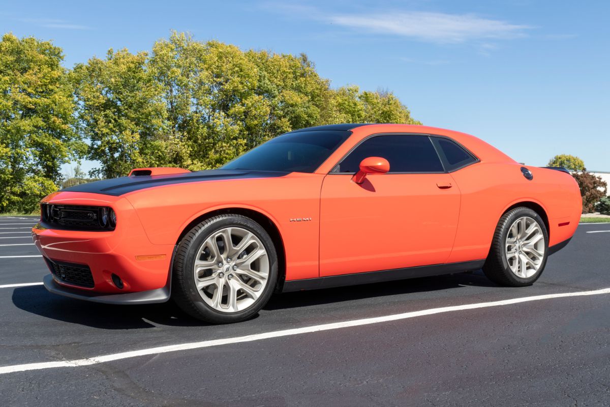 Side view look of dodge challenger sxt in the parking space.