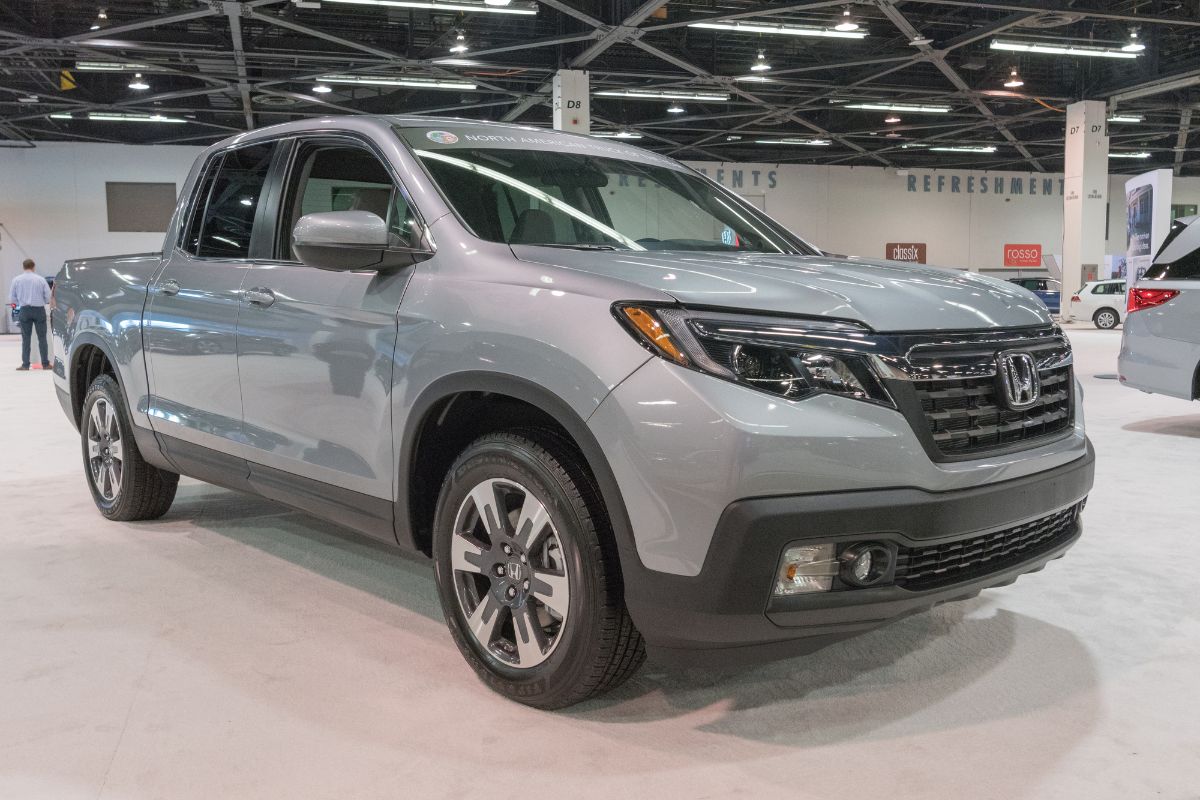 A front view of a gray 2022 Honda Ridgeline on car show.