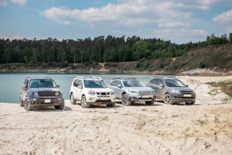 A group of suv cars lined up for a picture.