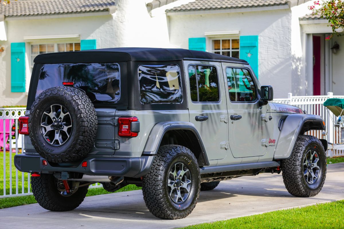 Back view of jeep wrangler rubicon infront of the house.