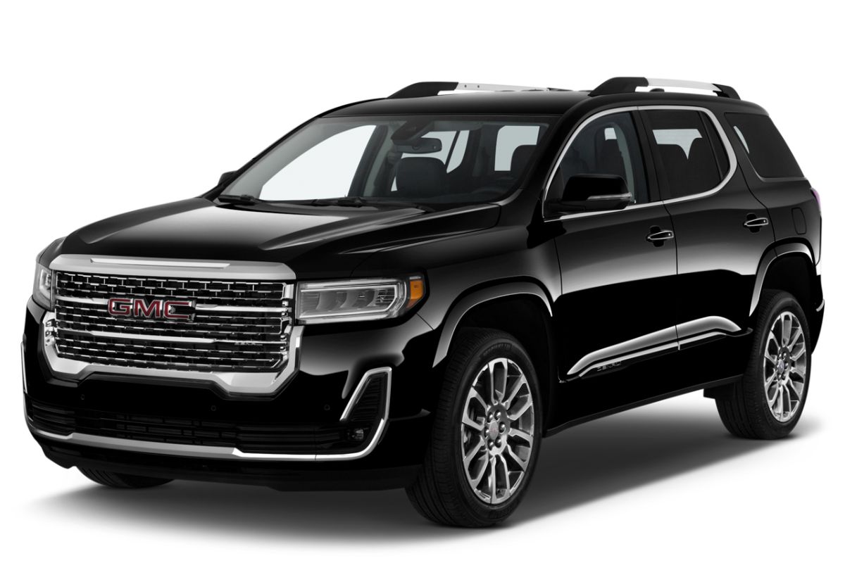 The bold brand new GMC Acadia 2022 model in a black colorway isolated in a white background.