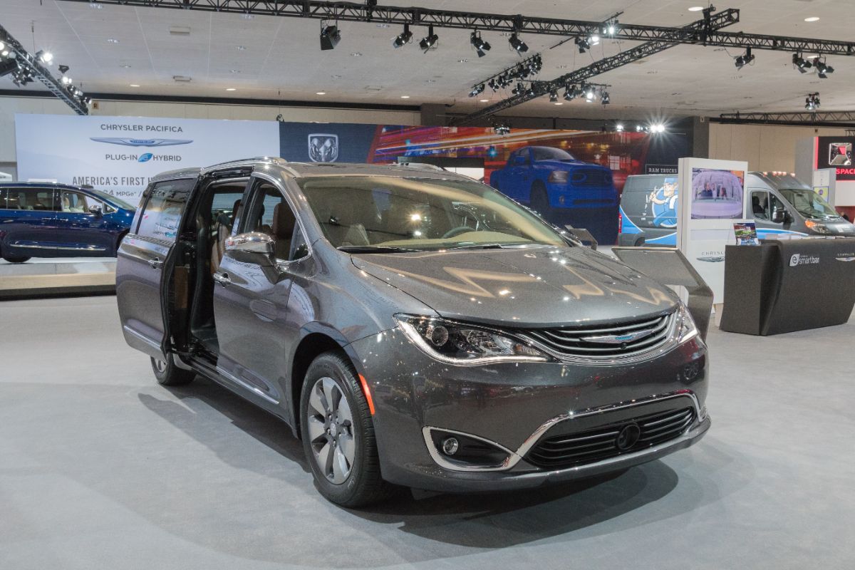 New gray Chrysler Pacifica Hybrid on display in an autoshow at Los Angeles.