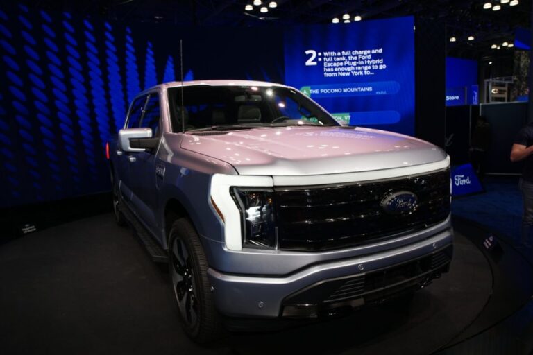 Front side view angle of the all new Ford Lighning in a full gray colorway in display at the Ford's Car dealership in New York.