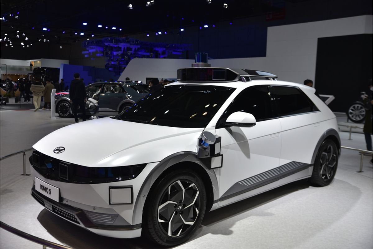 Brand new Hyundai Ioniq5 2021 model in white colorway displayed at a auto motor showroom.