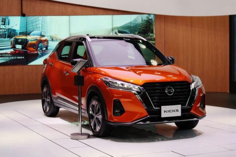 Brand new NIssan KIcks in orange colorway in display at the Nissan Dealership store.