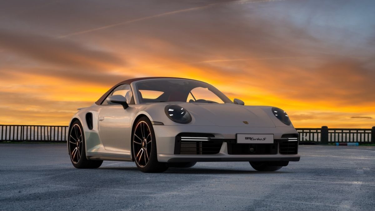 The all new Porsche 911 Turbo 2022 model photograped with mesmerizing sunset on the background.