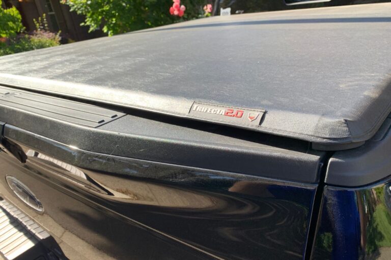 Close up photo of truck bed cover over the sun.