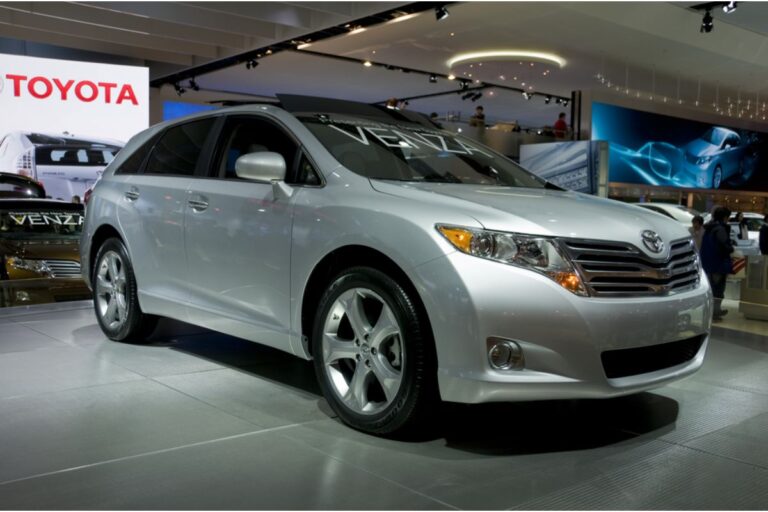 Side view angle of a Toyota Venza in silver colorway in display at the North American International Auto Show.