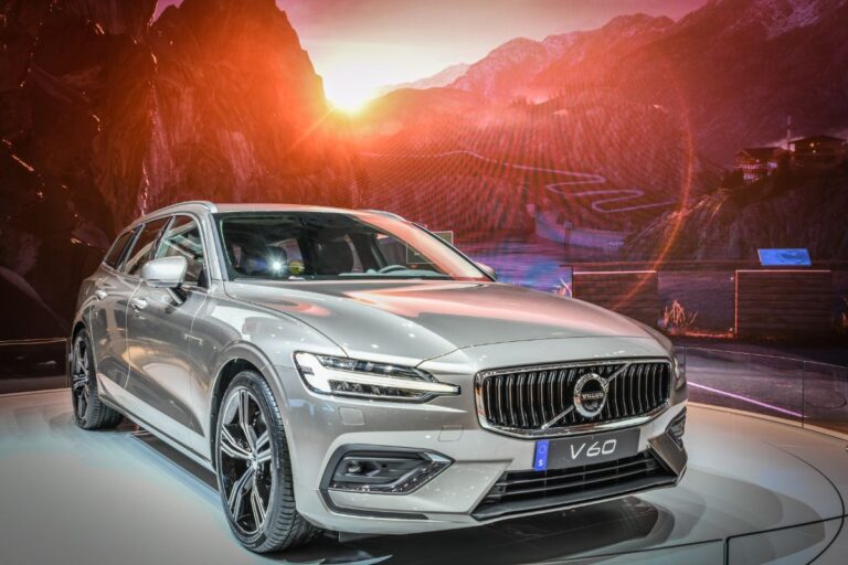 A photo of silver volvo v60 in auto show.