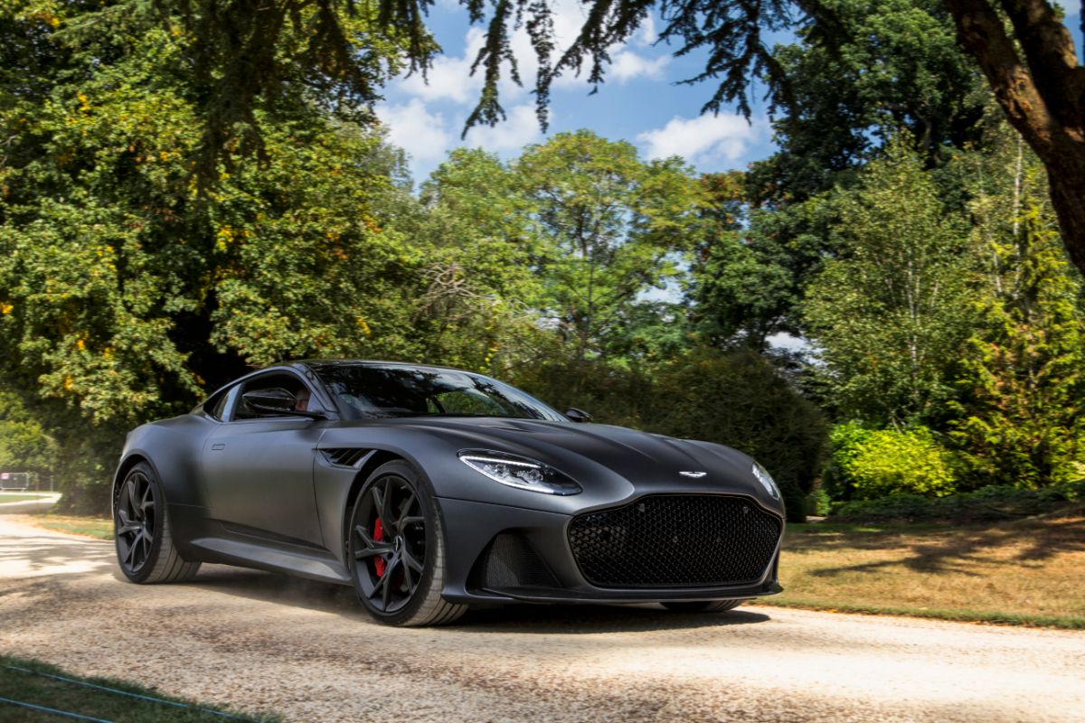 A black Aston Martin DBS Superleggera supercar seen from the front.