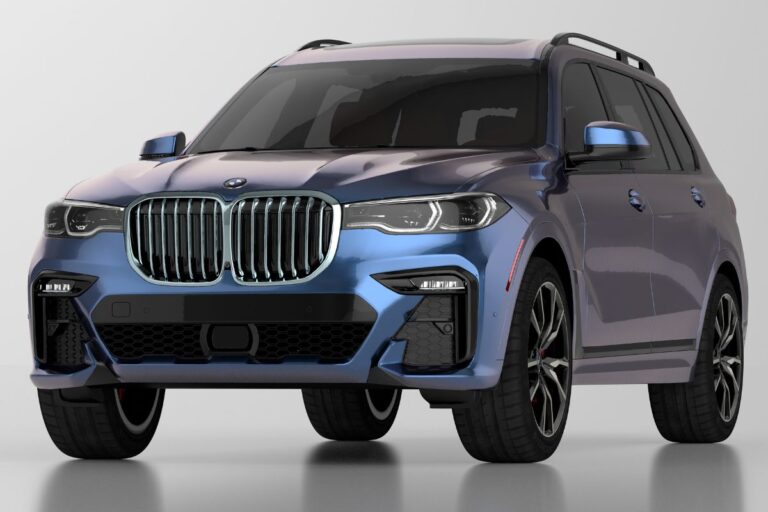 Close up photo of new BMW X7 car isolated on white room.