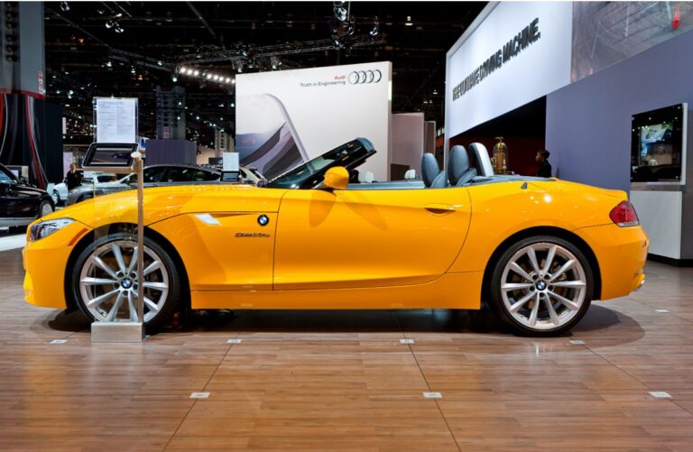 Side view look of BMW Z4 Roadster car in a yellow color at car show.