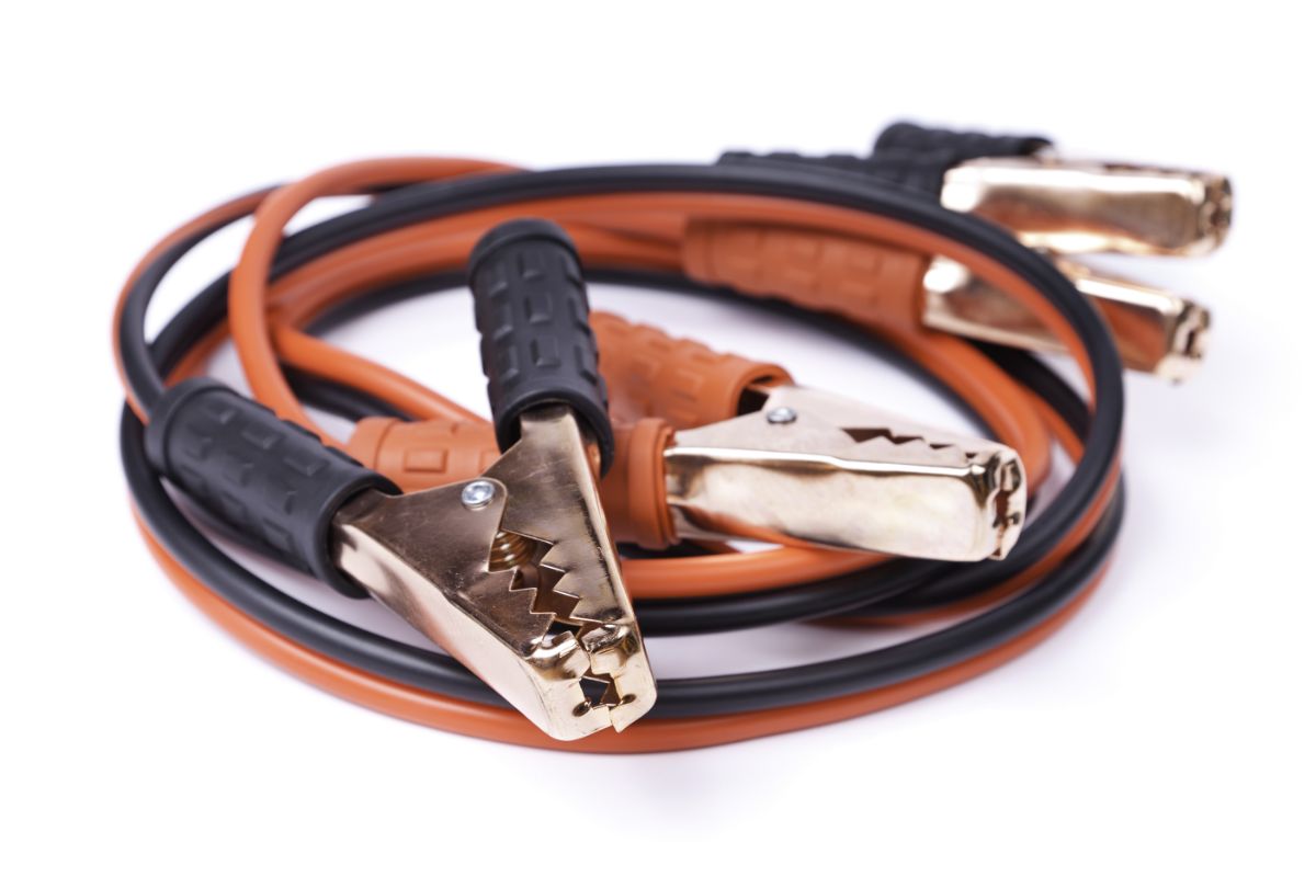 Booster cable in close-up, isolated on a white background.