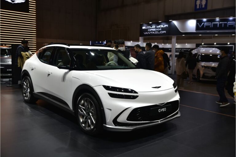 Side view angle of the all new Hyundai Genesis GV60 in all white colorway.