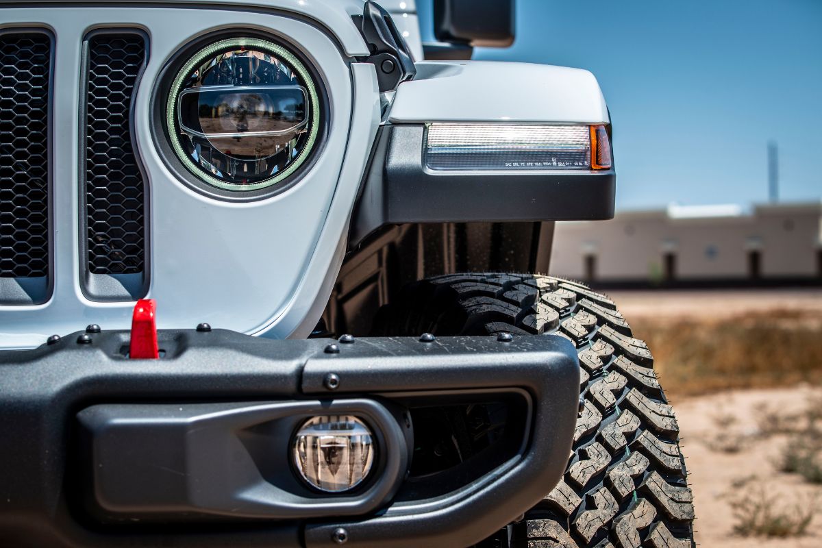 Portrait shot of grey jeep vehicle.