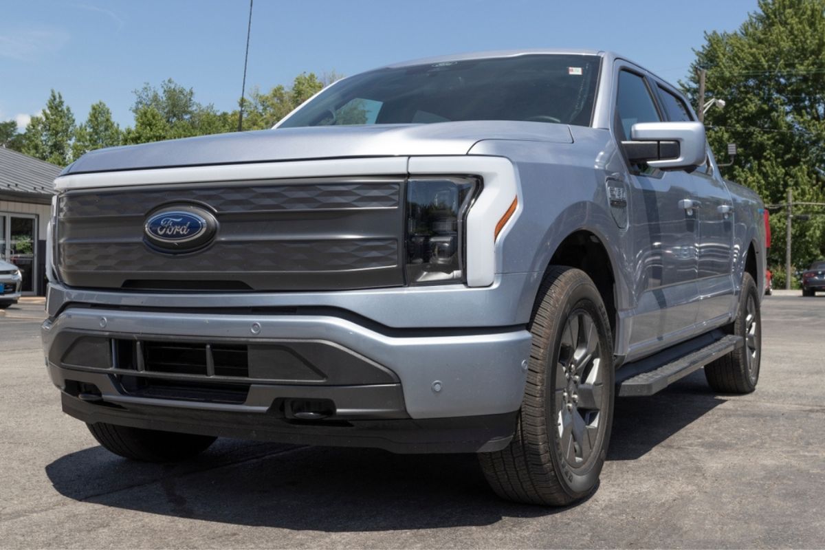 Ford F-150 Lightning display. Ford offers the F150 Lightning all-electric truck in Pro, XLT, Lariat, and Platinum models.