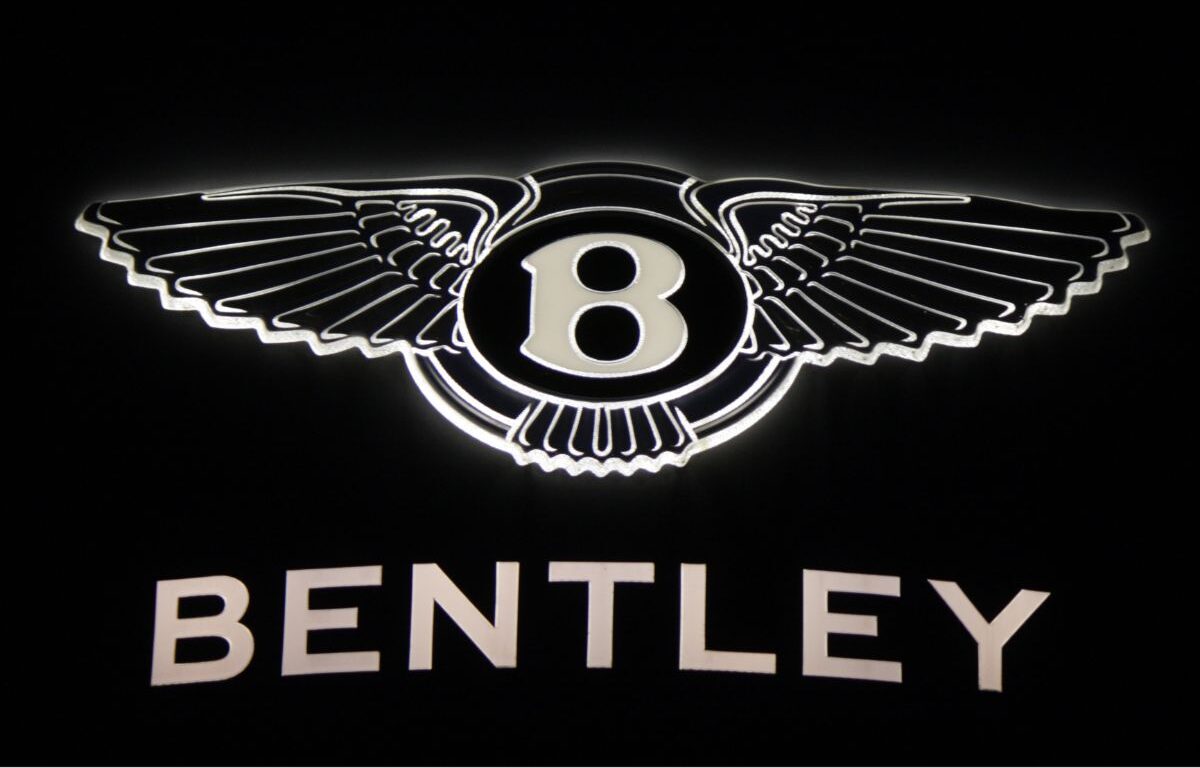 A Bentley Logo isolated in a plain black background.