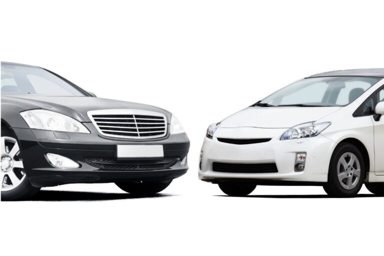 A photo of two cars black and white color facing each other, isolated on white background.