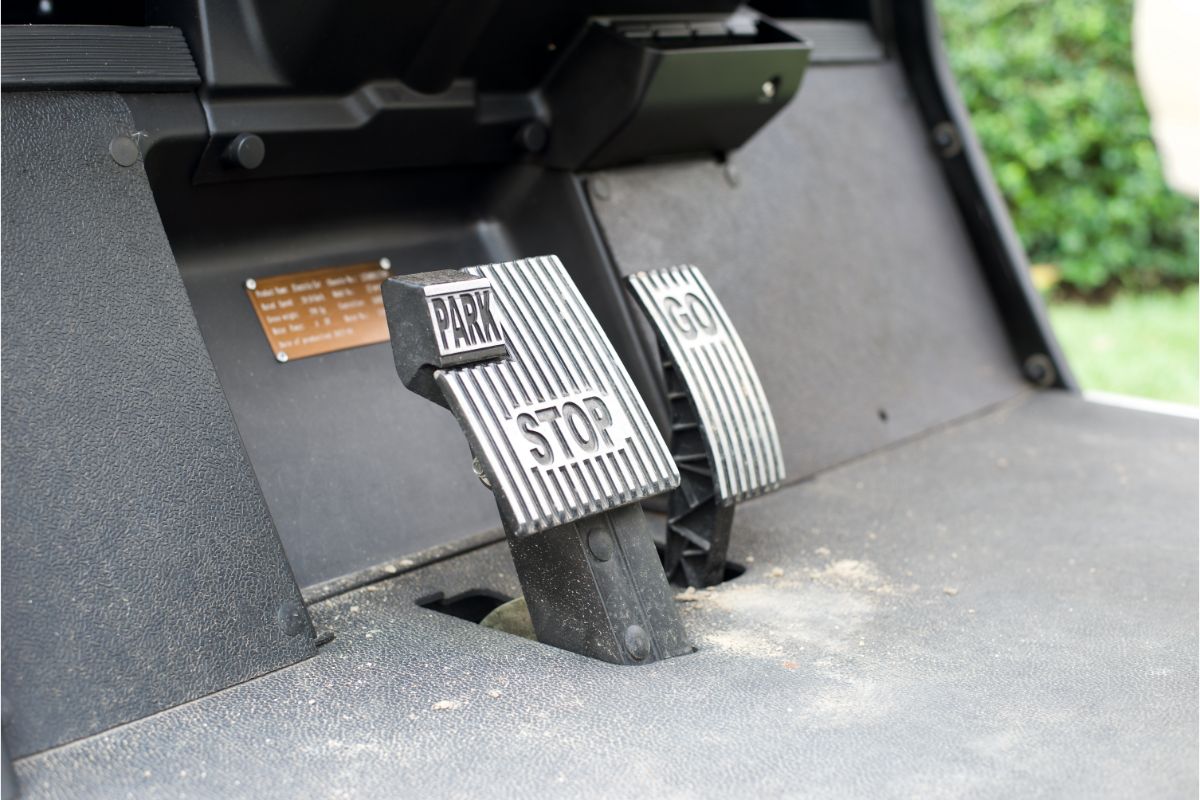 A close up photo of a brake and acceleration pedal of an electric vehicle.