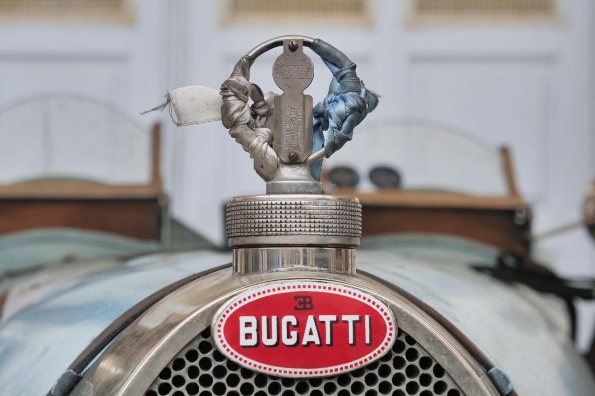 Bugatti vintage sportscar logo on a racing sportscar.