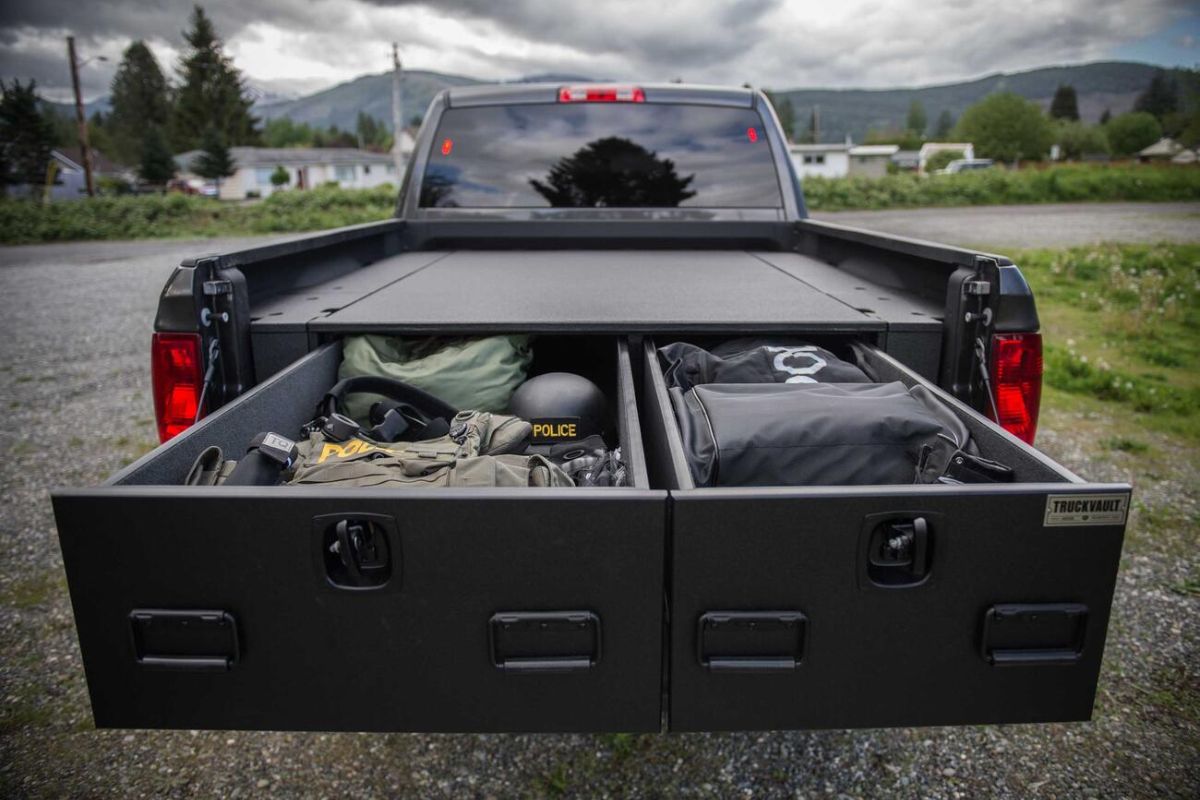 A back view of a truck with a bed that has drawers.