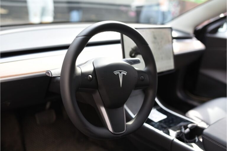 Tesla Motors' electric vehicle's steering wheel features the Tesla logo.