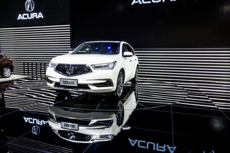 Brand new Acura MDX SUV in all white colorway in display at the North American International Auto Show.