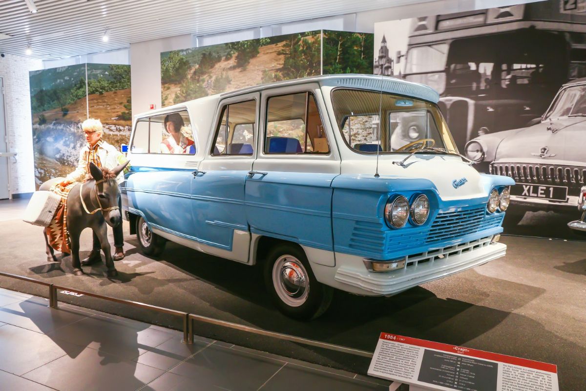 A photo of vintage minivan displayed at thr museum.