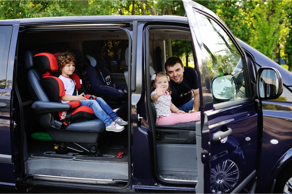 The family in the picture travels in the minivan.