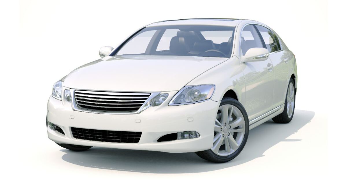 Front view of a luxury white sedan car isolated.