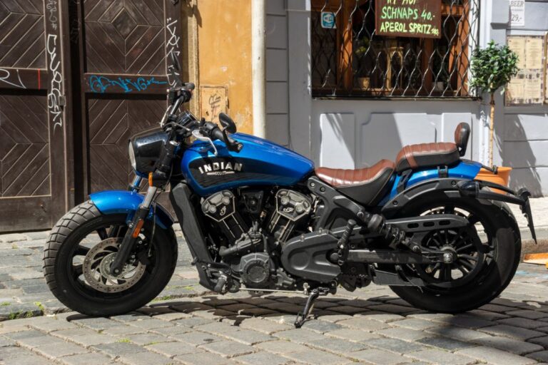 Side view angle of the Indian Scout motorcycle in black and blue colorway.