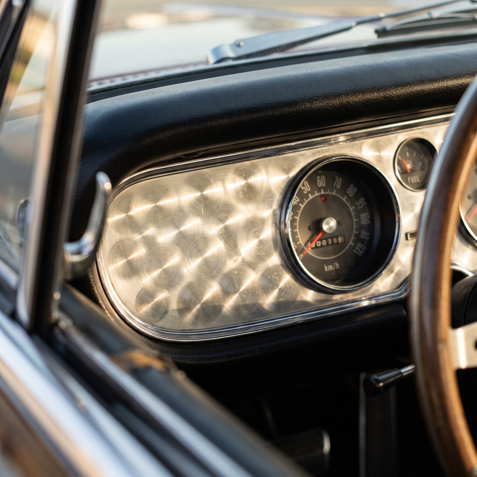 The Engine-Turned Metal Trim That Caught the Light Like Water