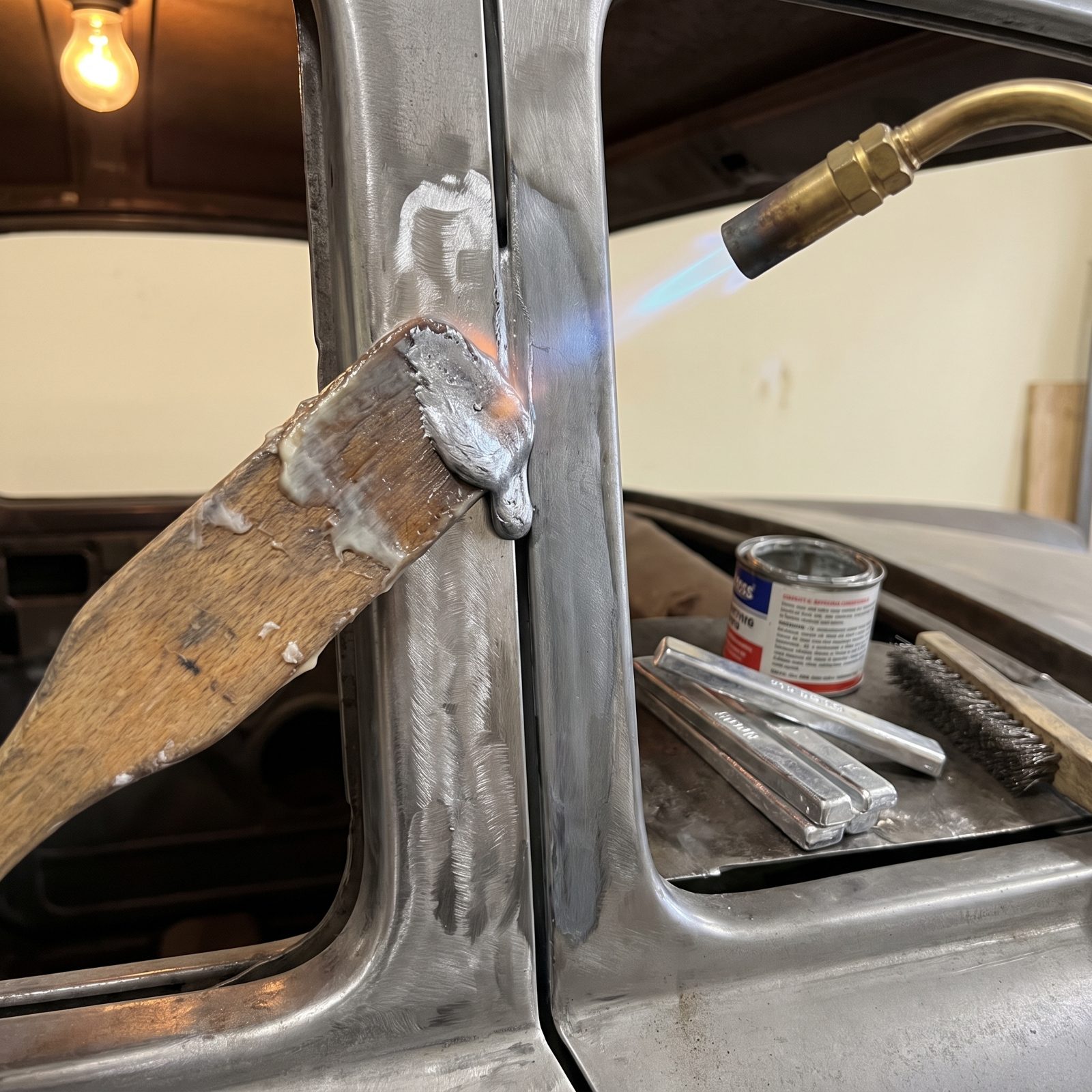 Filling Body Seams With Molten Lead