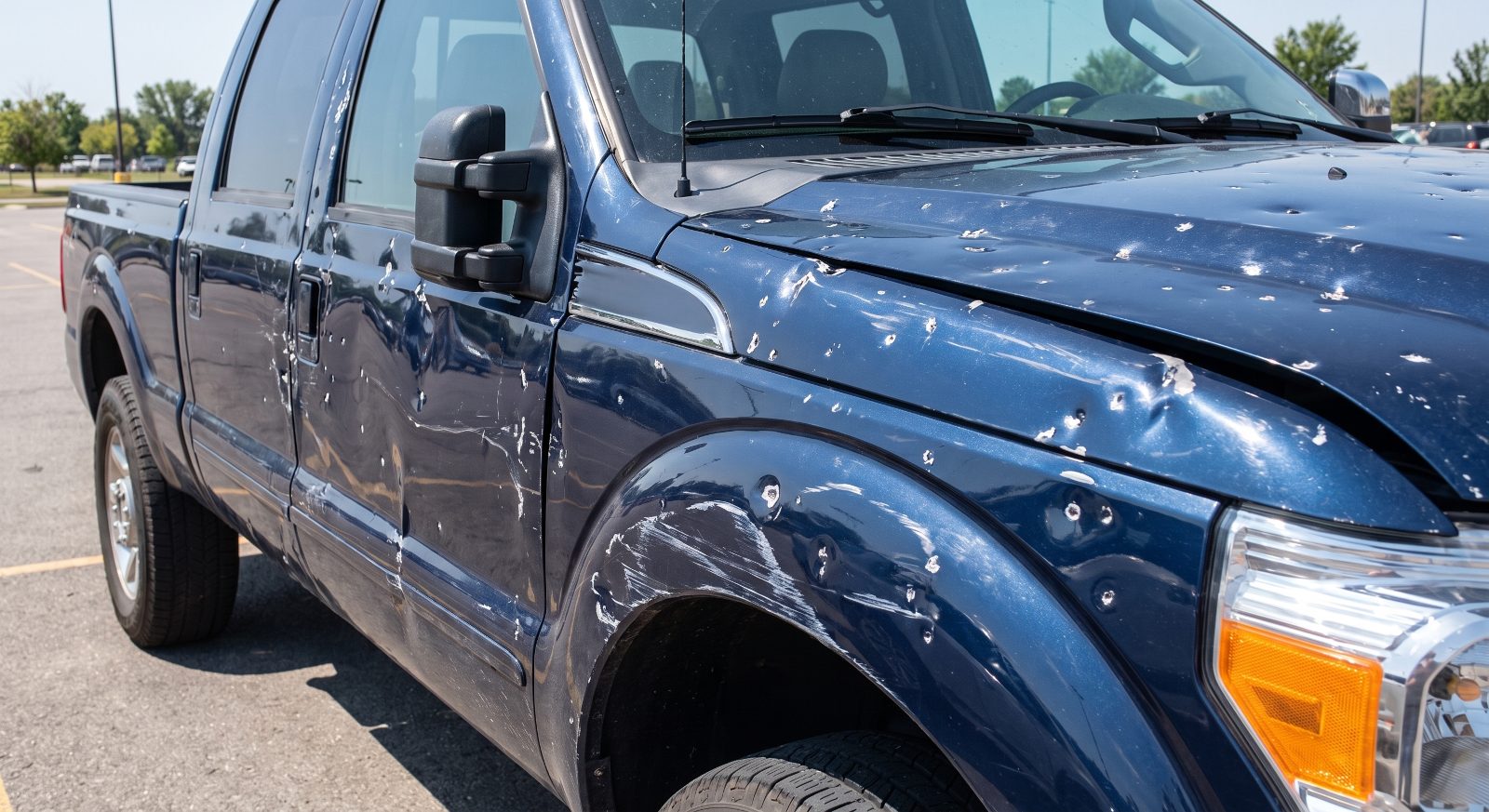 Dents, Deep Scratches, and Hail Damage Across the Body