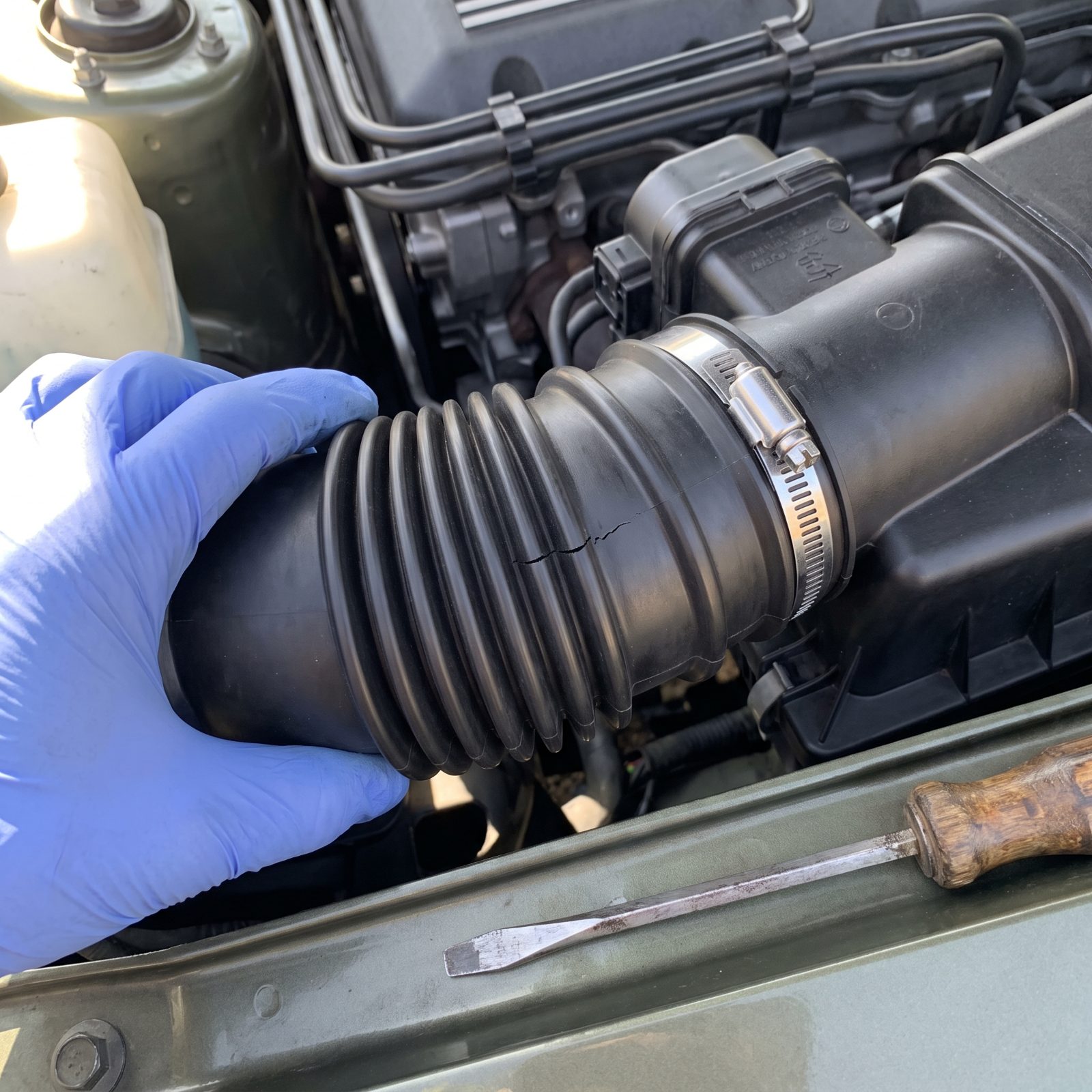 Inspect the Air-Intake Duct for Splits and Loose Clamps