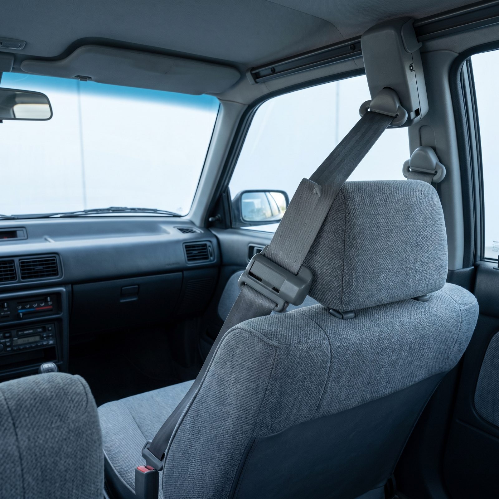 Motorized Automatic Seatbelts, Restraints That Traveled Along the Doorframe
