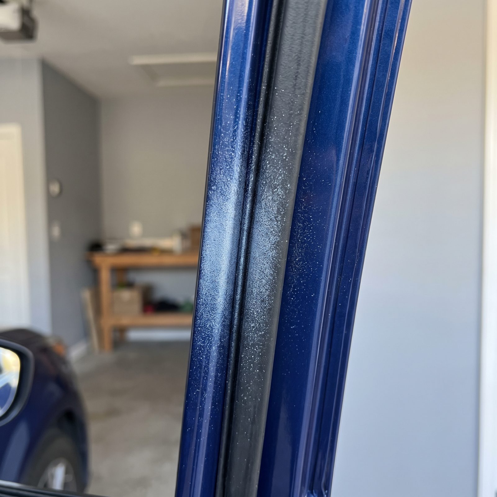 Paint Mist on the Door Seals Gives Away a Past Body Repair