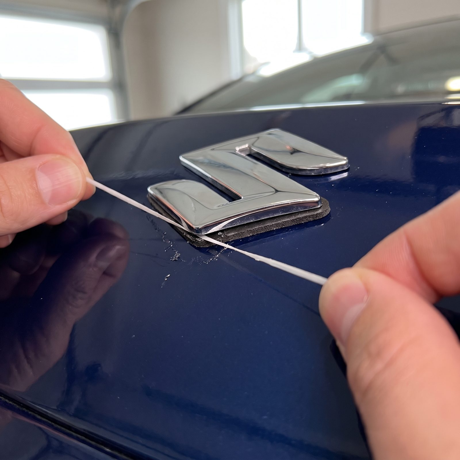 Saw Through Emblem Adhesive With Dental Floss