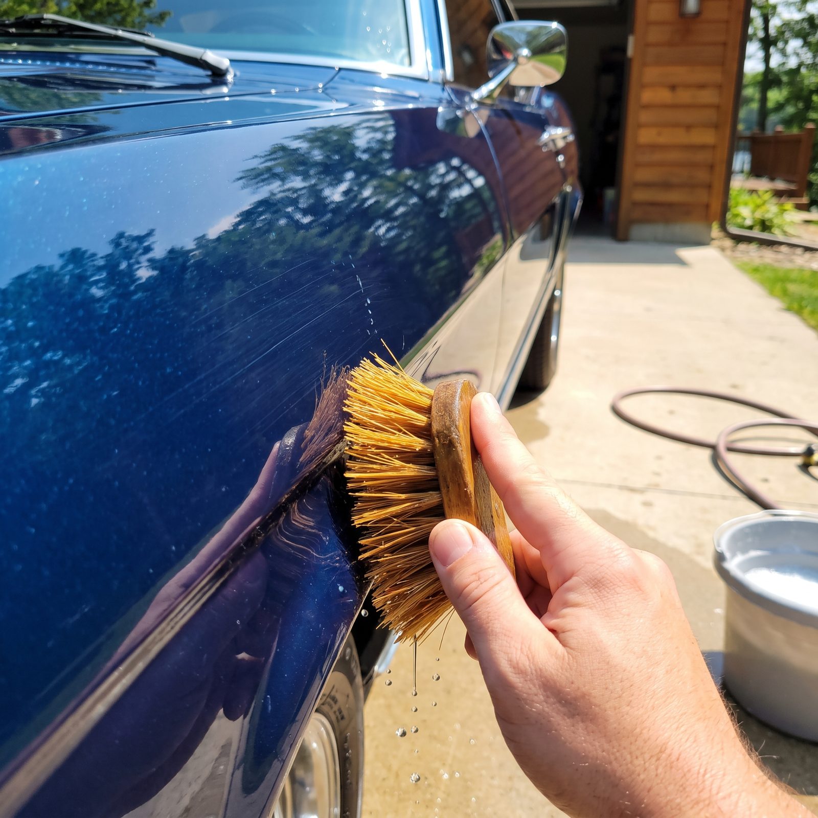 Scrubbing Paint With a Stiff-Bristled Brush