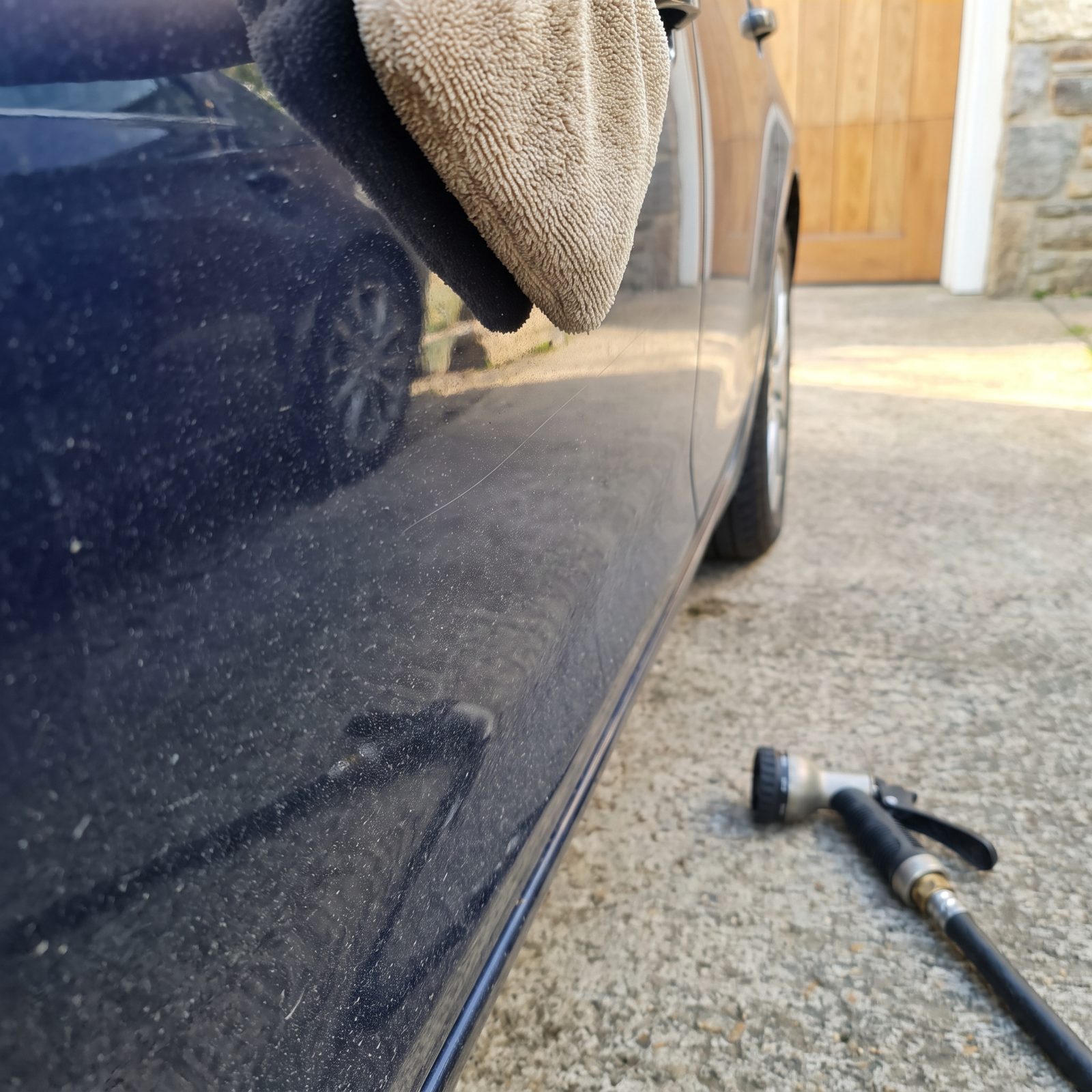 Scrubbing Before Rinsing Away Loose Grit