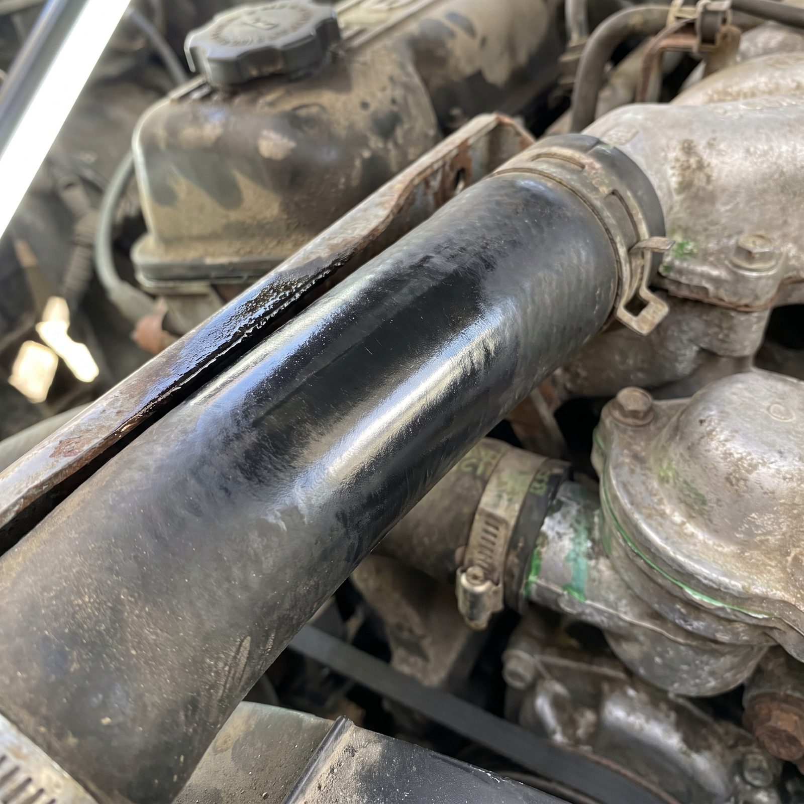 Shiny Rub Marks on a Hose Reveal Hidden Engine Movement